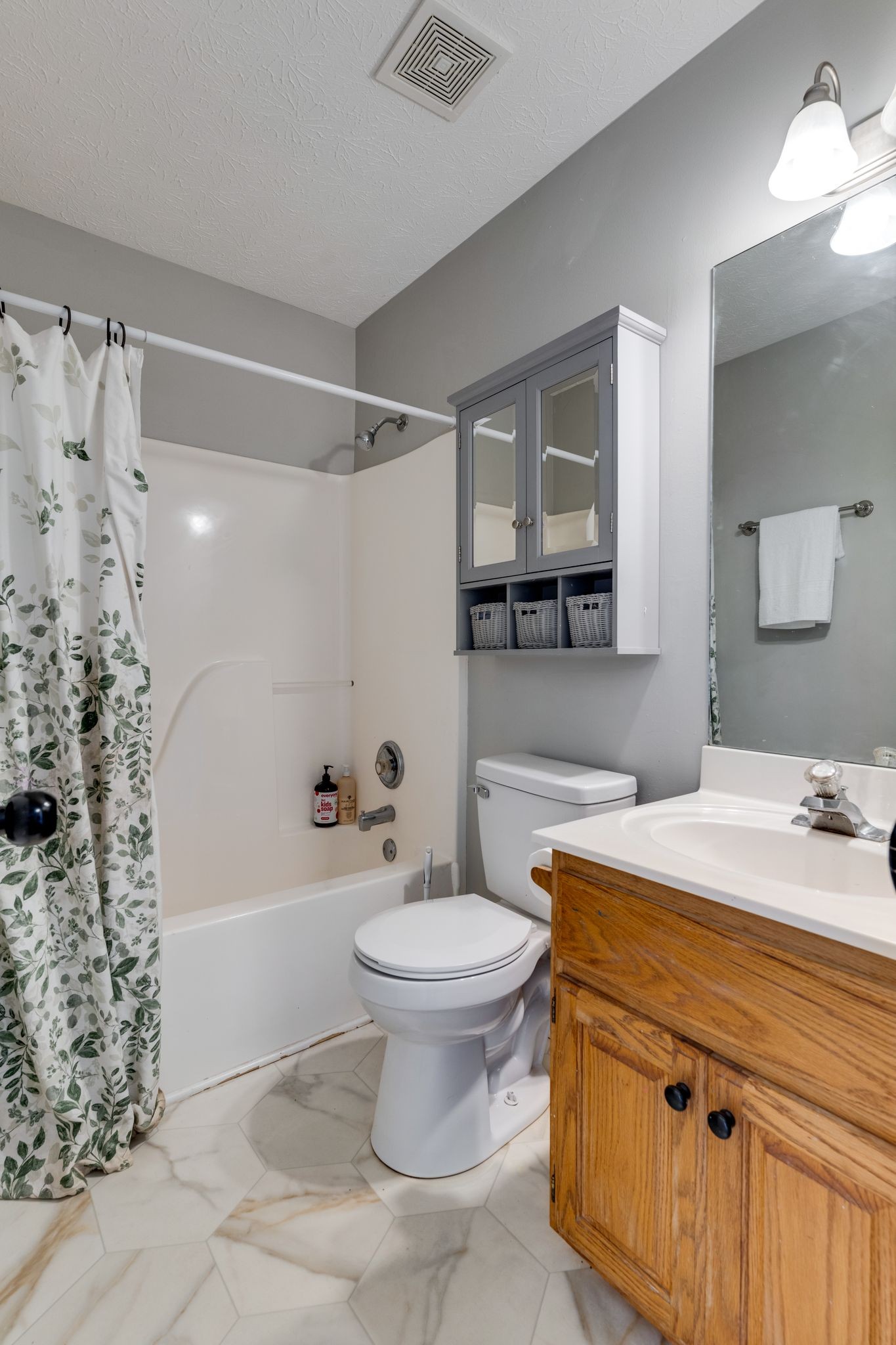 630 Portland Boulevard Portland, TN 37148 - Photo 24 of 29 a bathroom with a sink toilet and shower