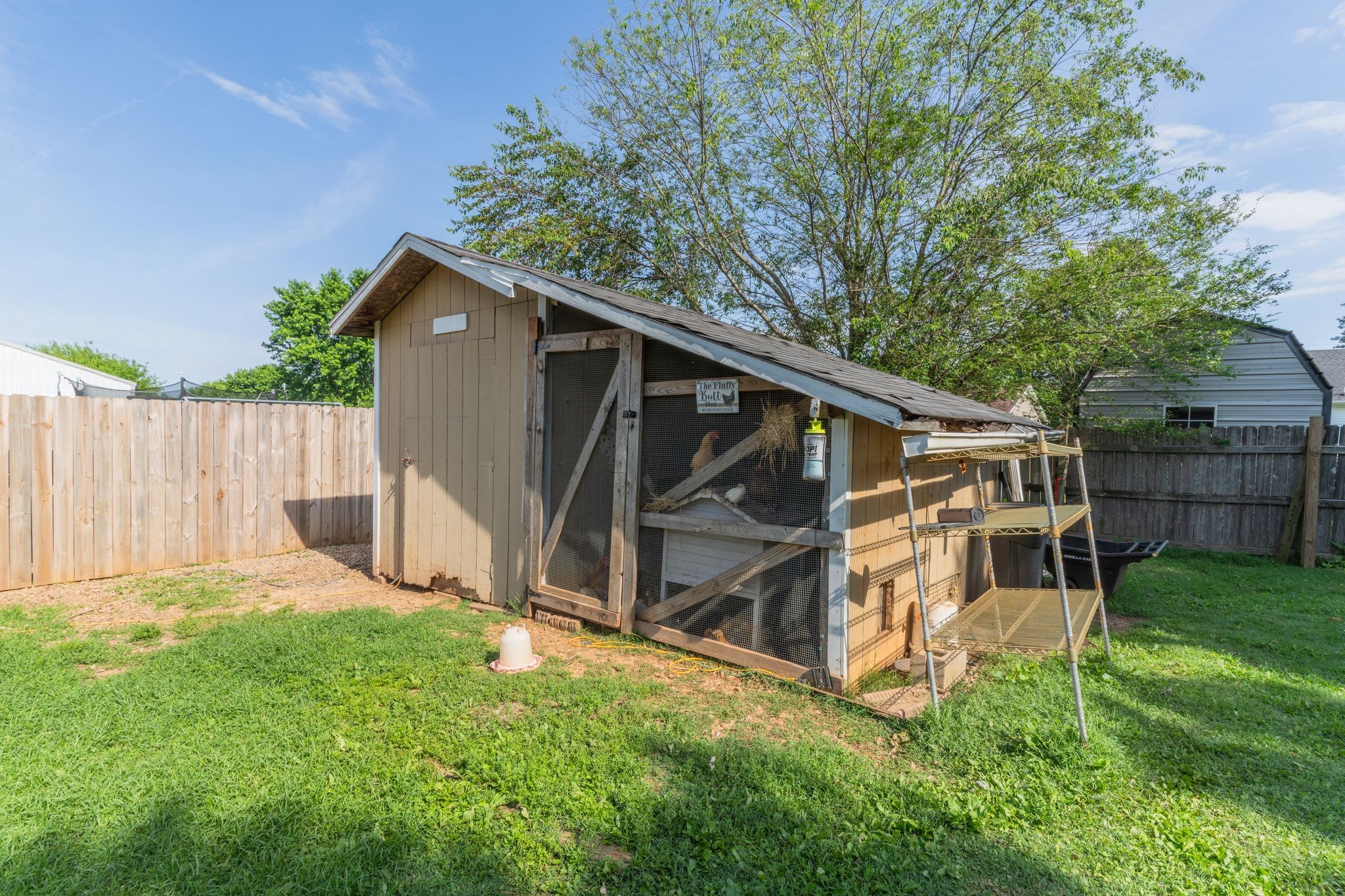 630 Portland Boulevard Portland, TN 37148 - Photo 28 of 29 a view of backyard with small cabin and wooden fence