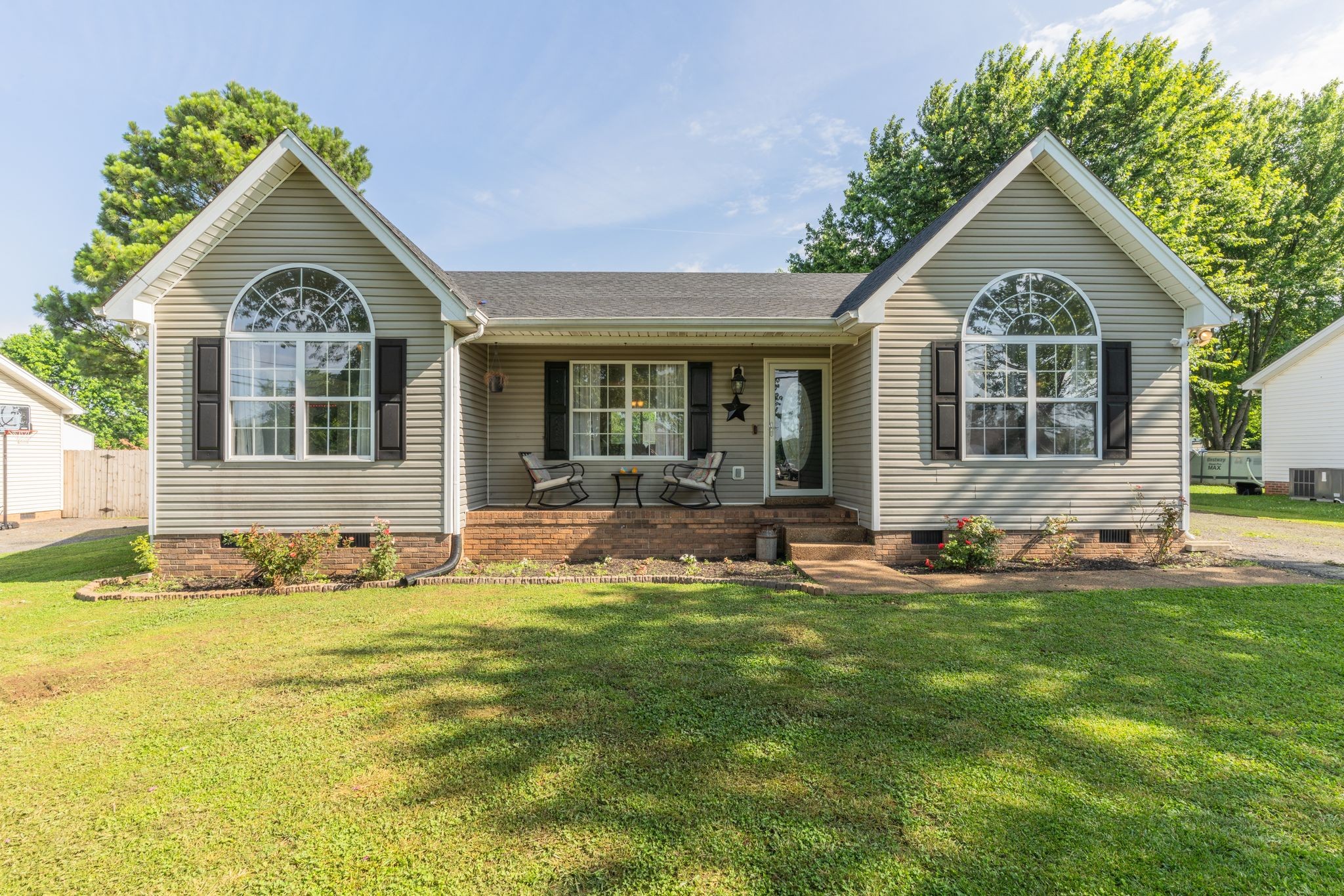 630 Portland Boulevard Portland, TN 37148 - Photo 3 of 29 a front view of a house with a yard