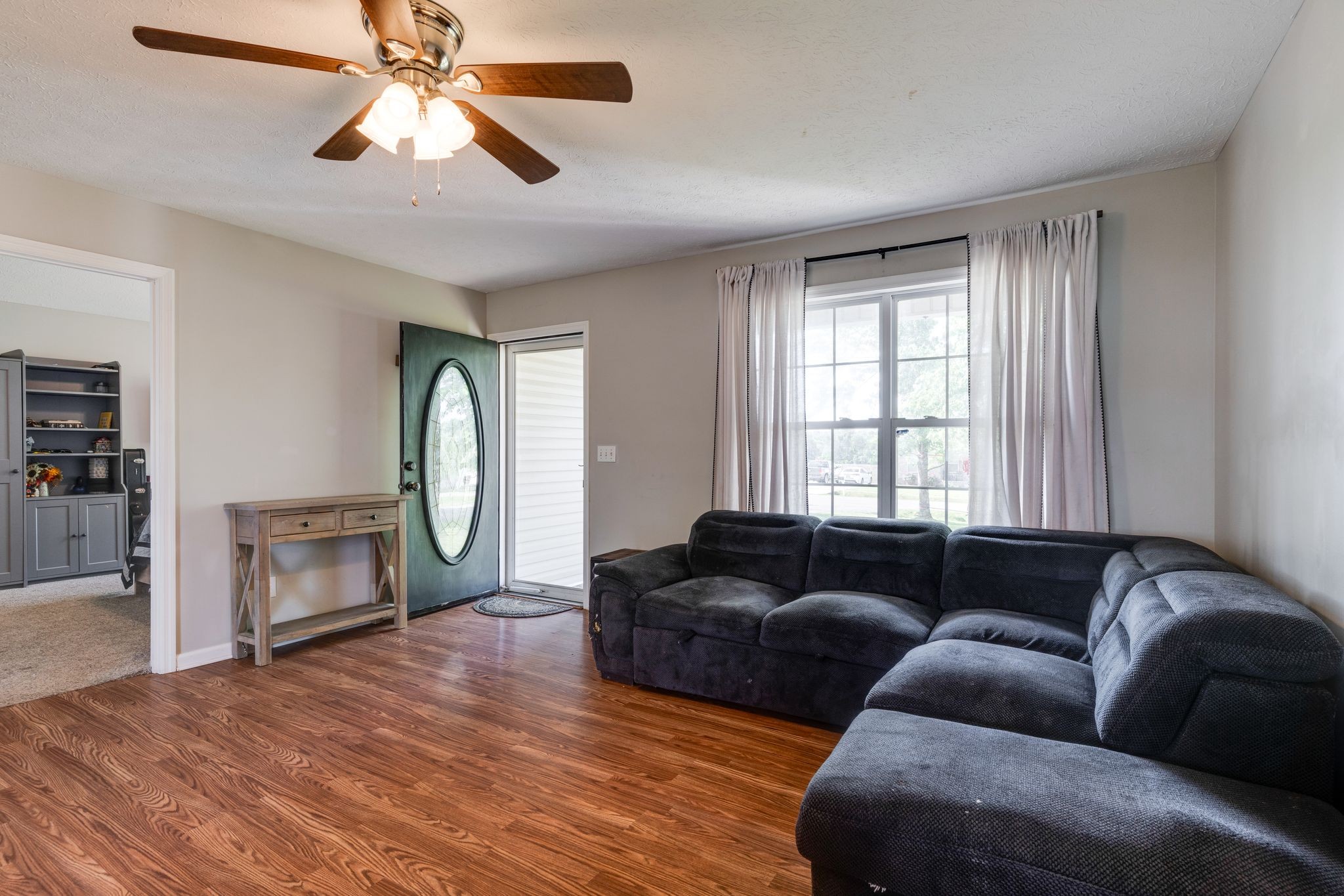 630 Portland Boulevard Portland, TN 37148 - Photo 7 of 29 a living room with furniture and a fireplace