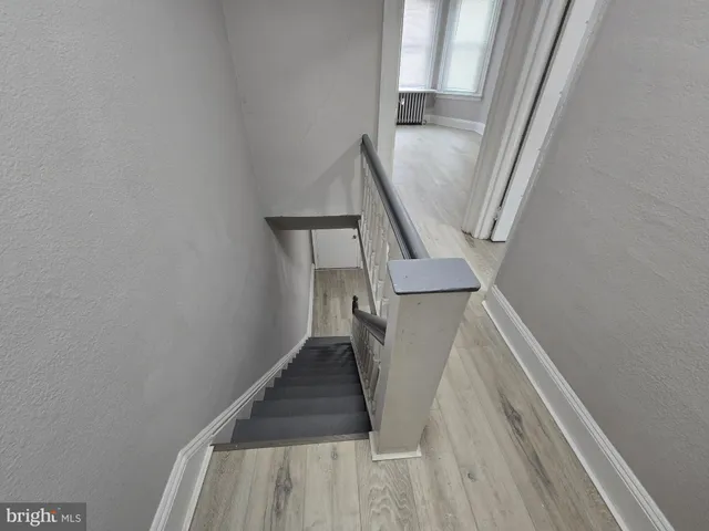 a view of a building with a glass door