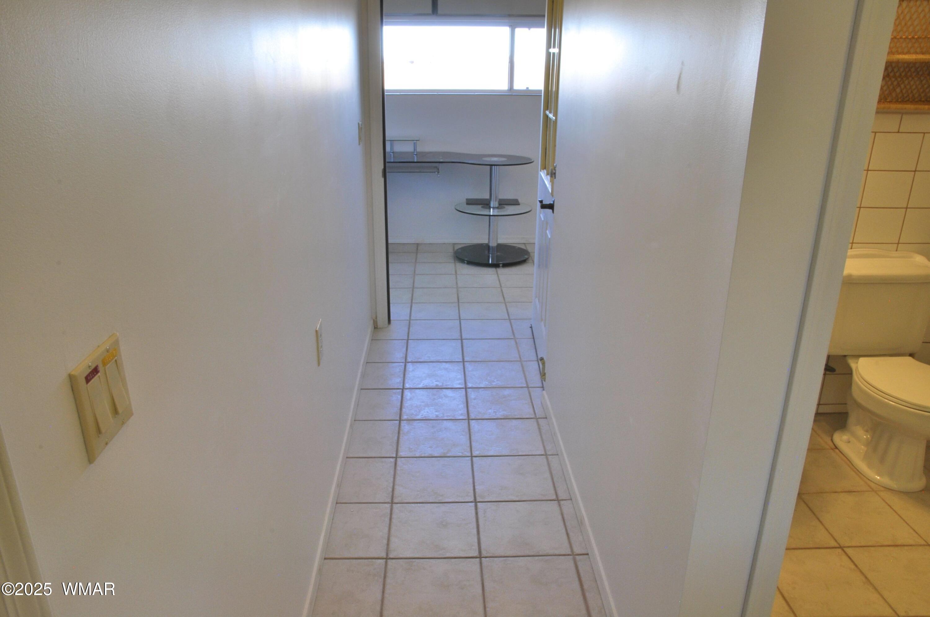 5196 White Antelope Road Snowflake, AZ 85937 - Photo 15 of 58 a bathroom with a shower and a toilet
