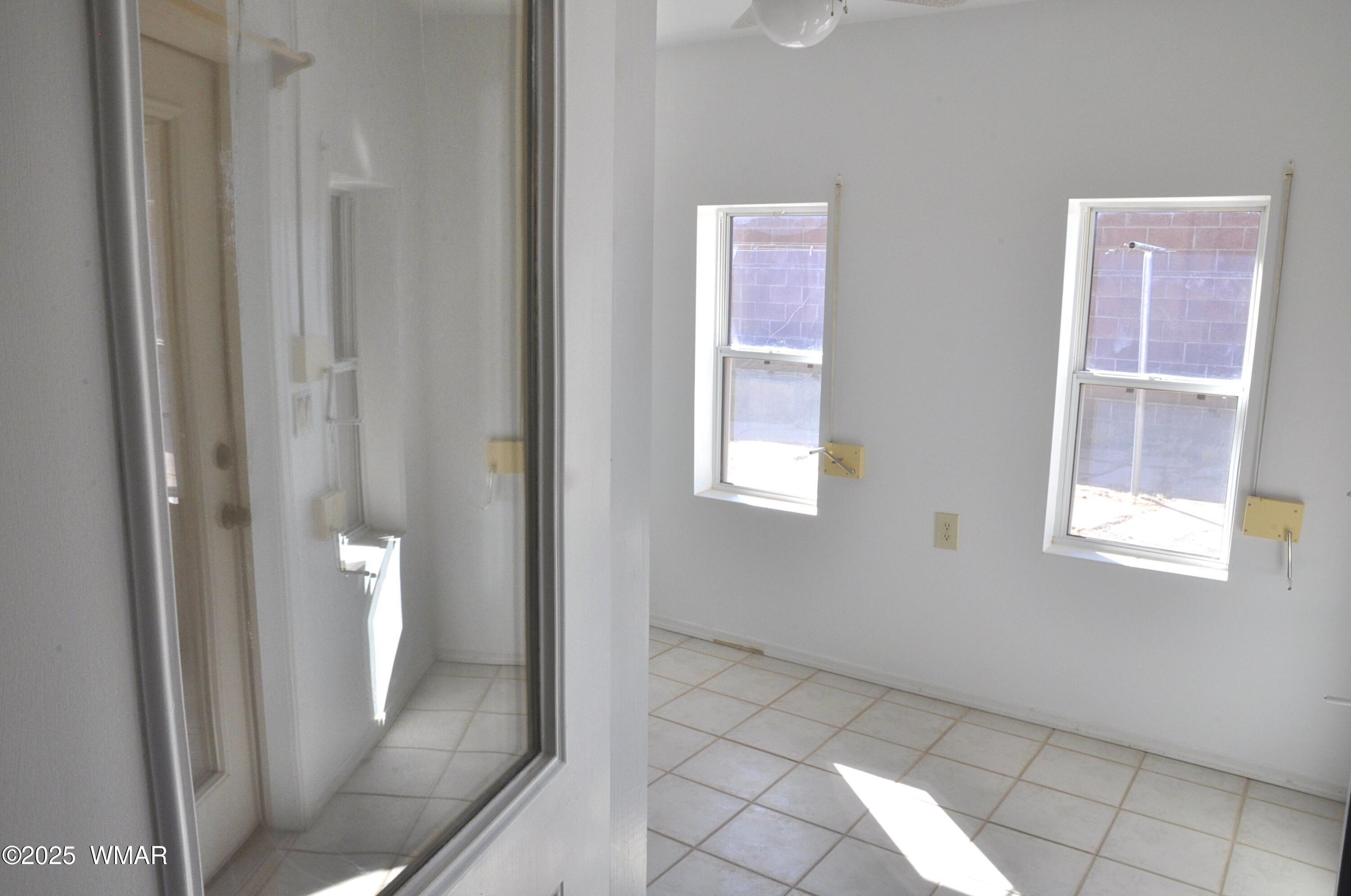 5196 White Antelope Road Snowflake, AZ 85937 - Photo 21 of 58 a view of an empty room with windows