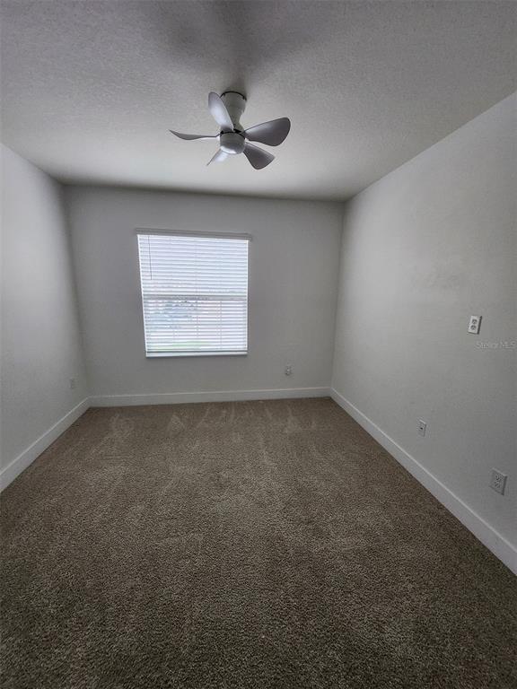 2359 Tay Wes Drive St. Cloud, FL 34771 - Photo 12 of 15 an empty room with a window