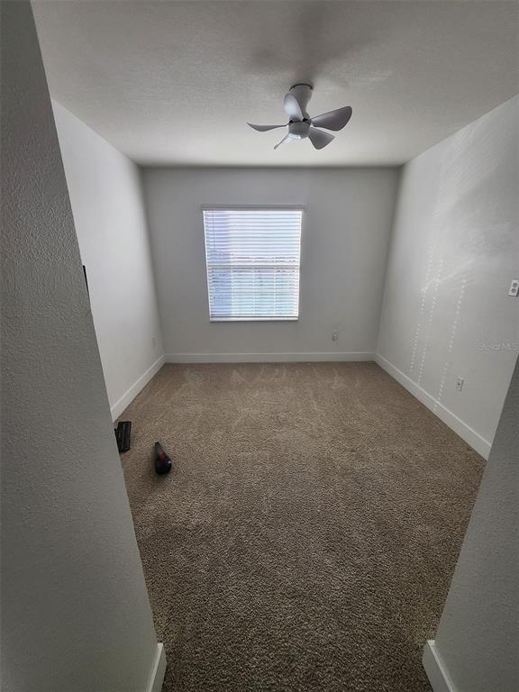 2359 Tay Wes Drive St. Cloud, FL 34771 - Photo 10 of 15 an empty room with windows