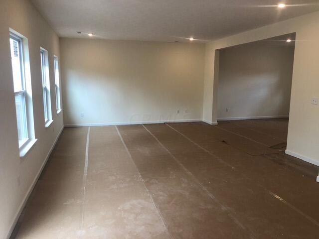 11 Thurber Road Ashville, OH 43103 - Photo 24 of 28 GREAT ROOM w/LVP FLOORING & LED LIGHTS on DIMMER