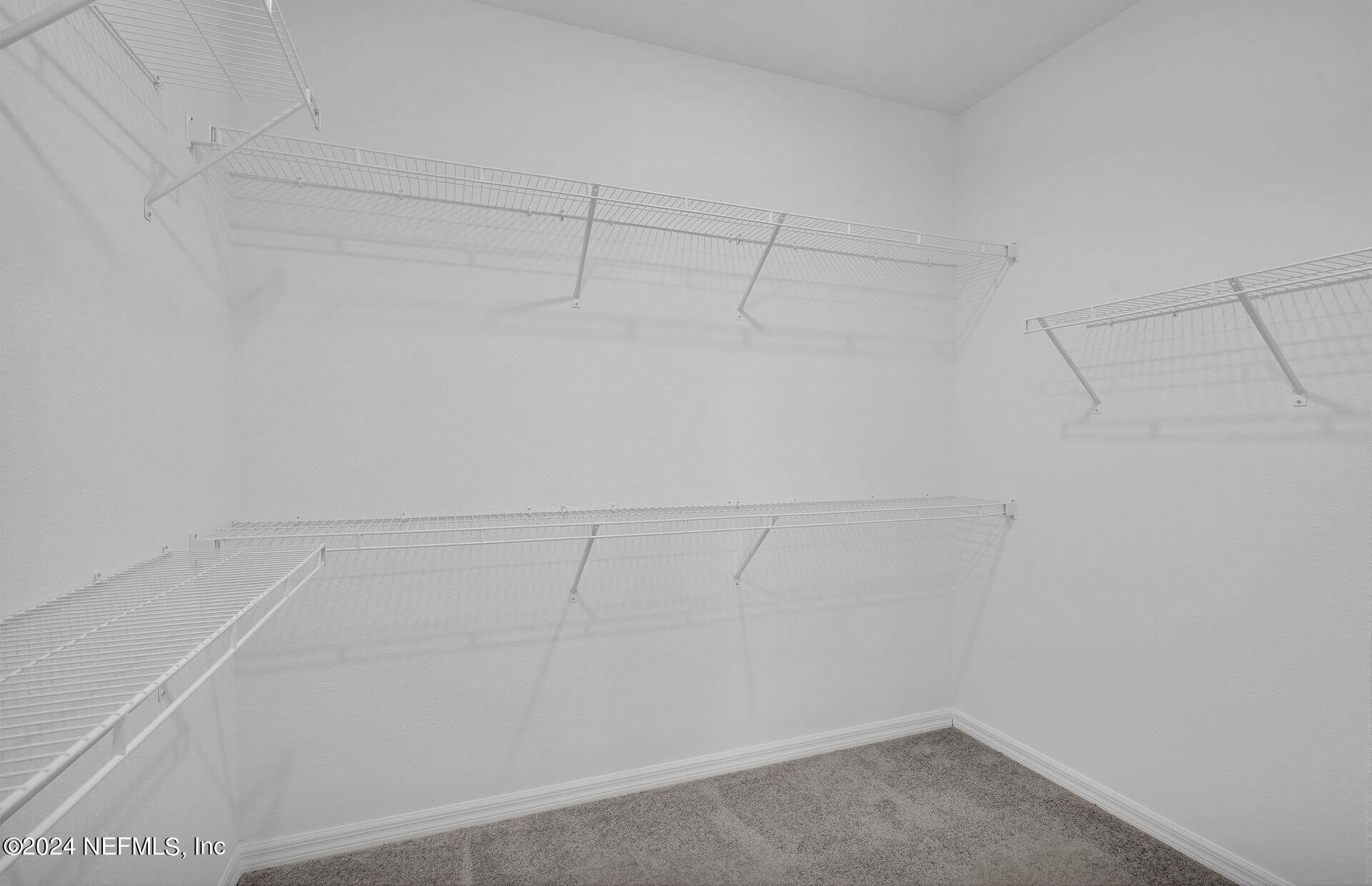 318 Shortleaf Lane Yulee, FL 32097 - Photo 18 of 30 Spruce Owner's Walk-In Closet