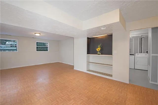 a storage room with dryer and washer