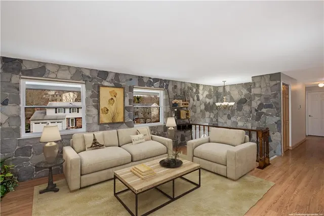 a living room with furniture and a couch