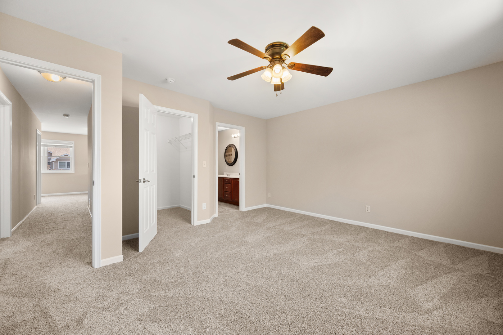 3705 Green Tree Lane DeKalb, IL 60115 - Photo 17 of 31 an empty room with closet and windows