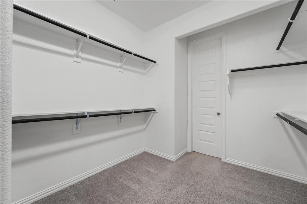 3533 Hyacinth Way Prosper, TX 75078 - Photo 20 of 38 a view of an empty walk in closet