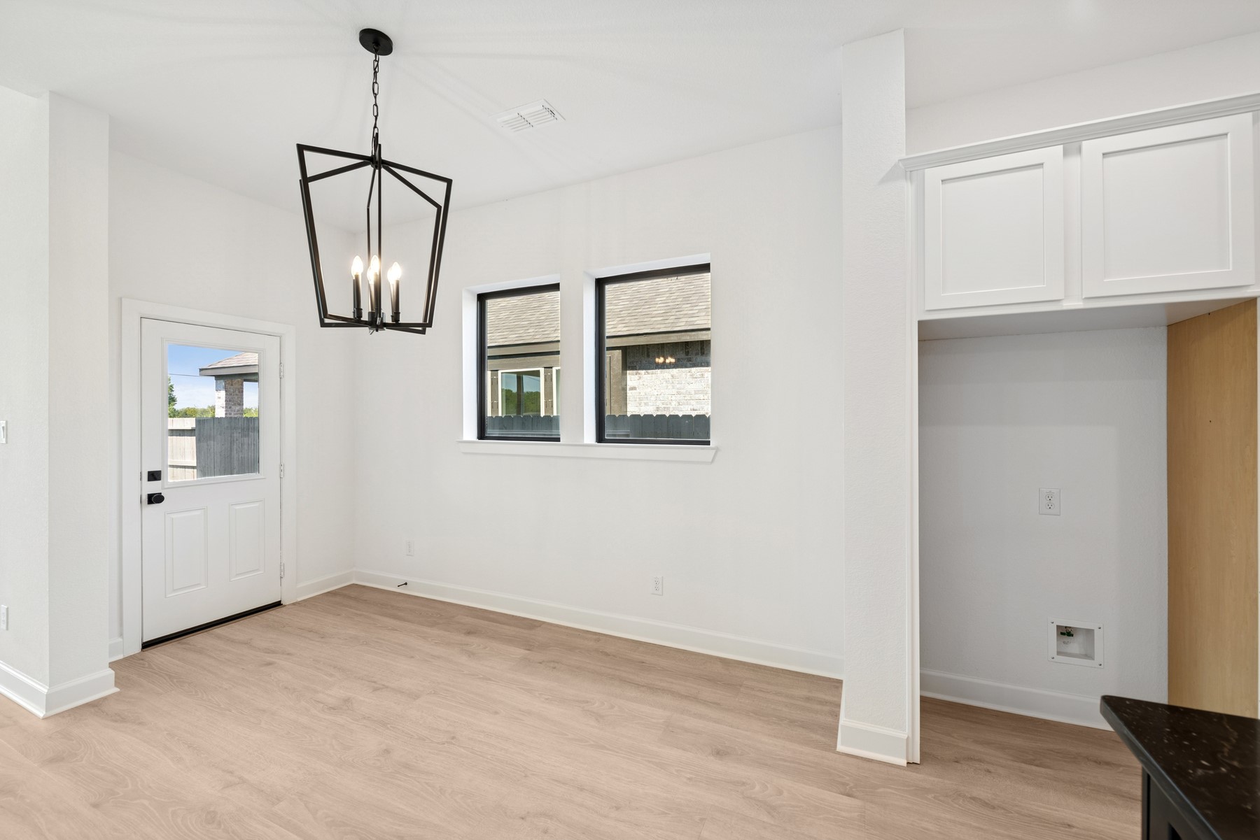 5526 Orangery Lane Manvel, TX 77578 - Photo 20 of 47 a view of empty room with wooden floor