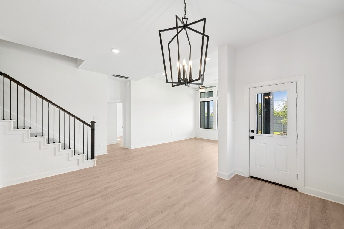 5526 Orangery Lane Manvel, TX 77578 - Photo 22 of 47 a view of hallway with wooden floor