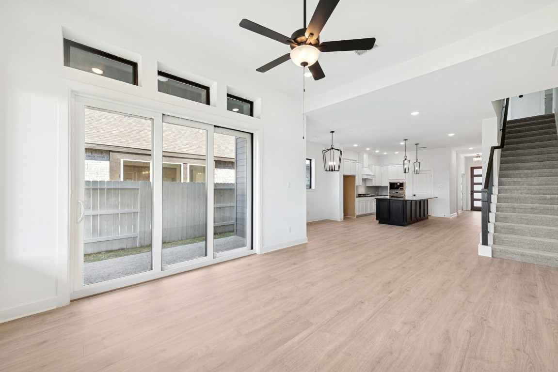 5526 Orangery Lane Manvel, TX 77578 - Photo 24 of 47 a view of kitchen with furniture and a ceiling fan