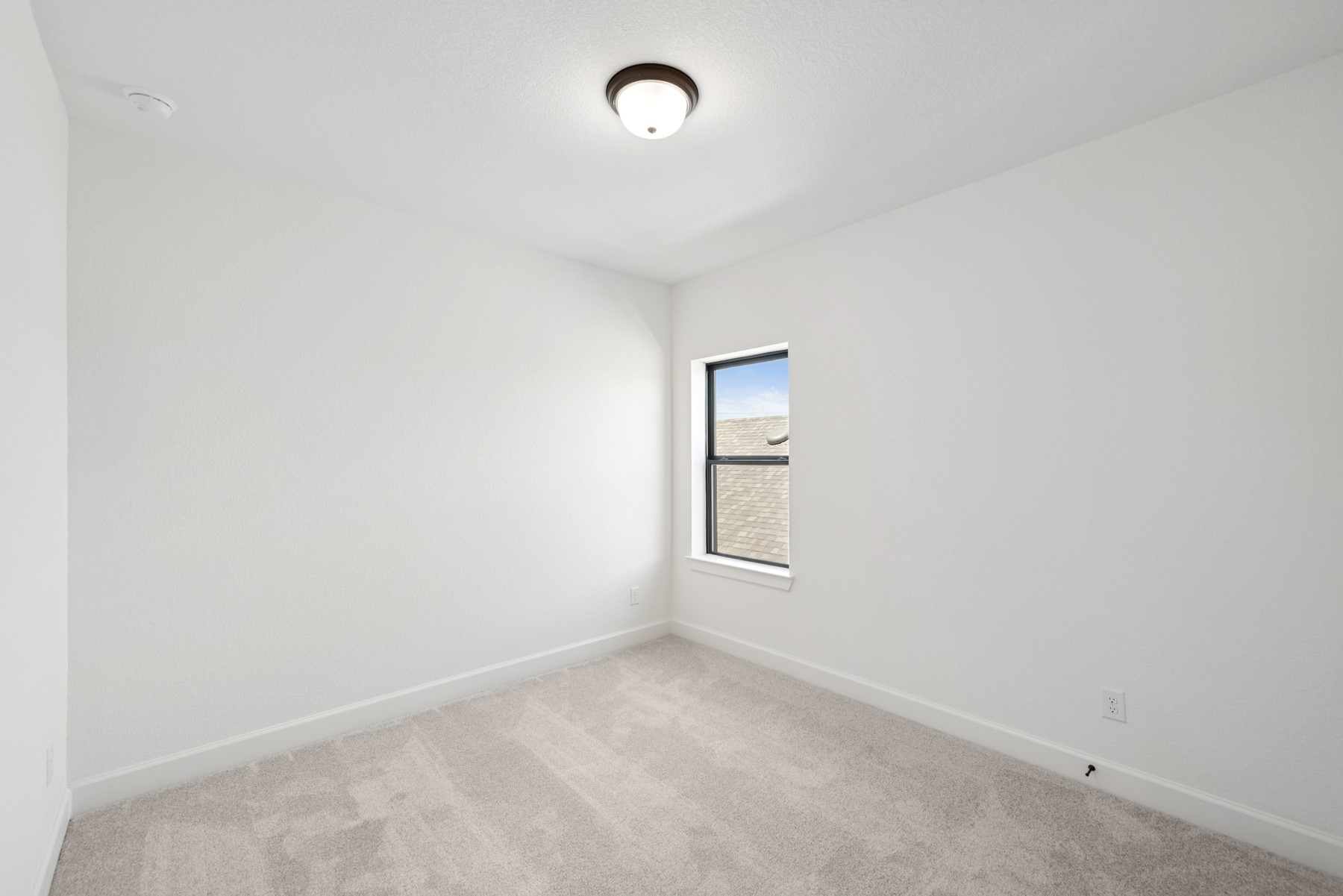 5526 Orangery Lane Manvel, TX 77578 - Photo 32 of 47 an empty room with a empty space and window