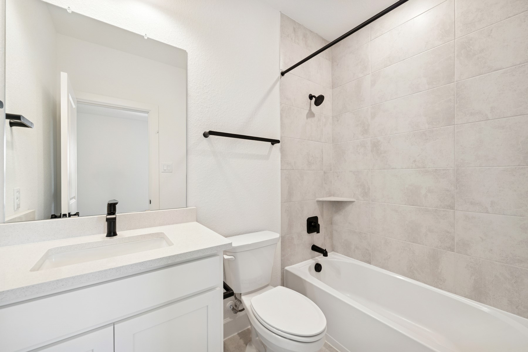 5526 Orangery Lane Manvel, TX 77578 - Photo 34 of 47 a bathroom with a sink a toilet and shower