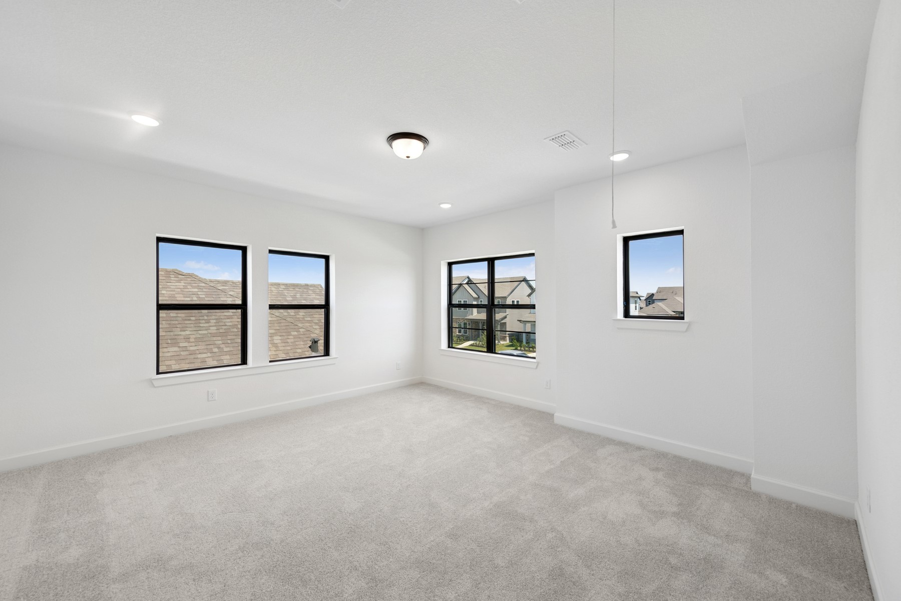5526 Orangery Lane Manvel, TX 77578 - Photo 35 of 47 an empty room with windows and cabinet