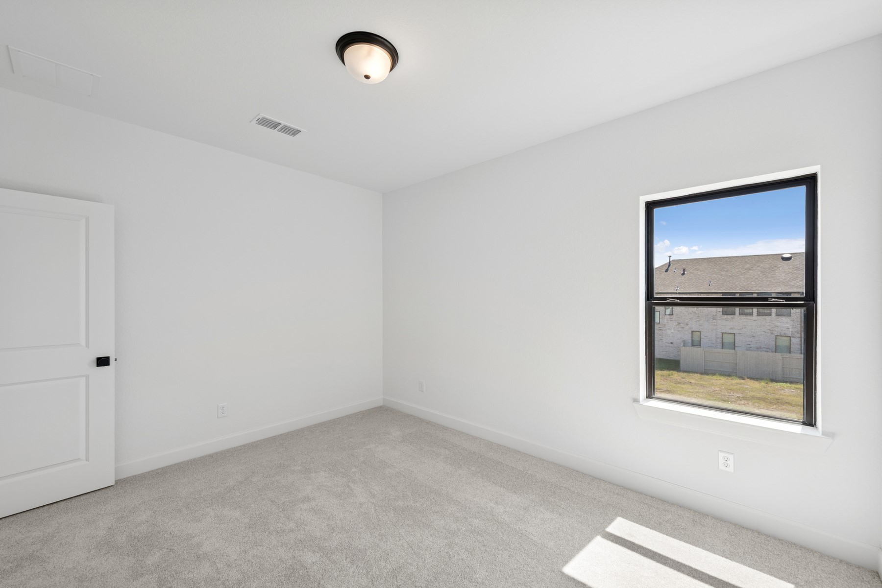 5526 Orangery Lane Manvel, TX 77578 - Photo 41 of 47 an empty room with a window