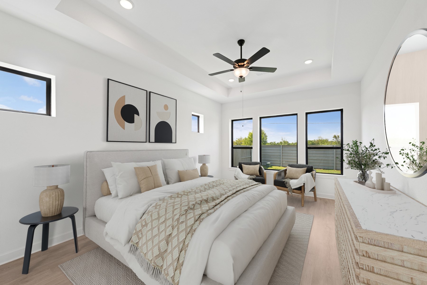 5526 Orangery Lane Manvel, TX 77578 - Photo 5 of 47 a bedroom with a large bed and a large window