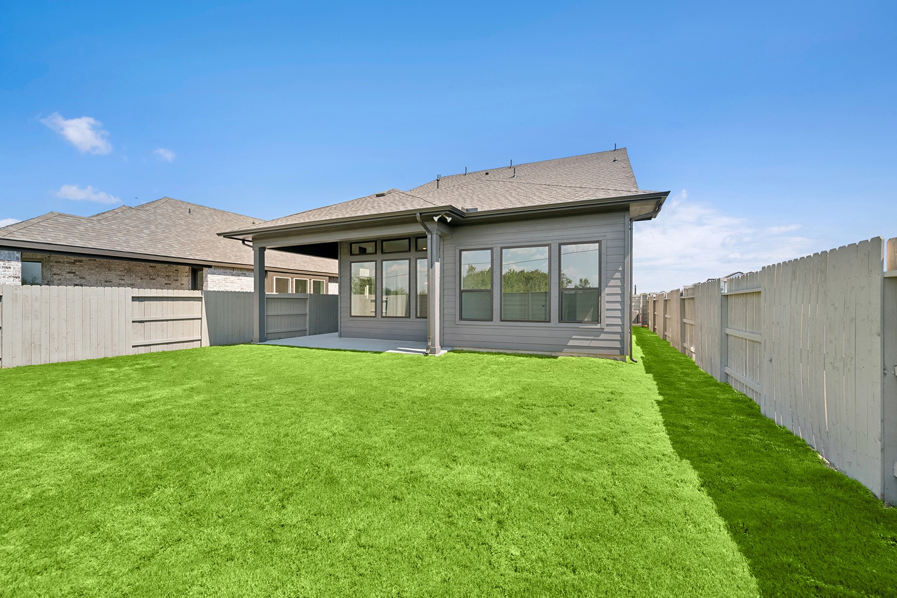 5526 Orangery Lane Manvel, TX 77578 - Photo 9 of 47 a view of a house with backyard and a garden
