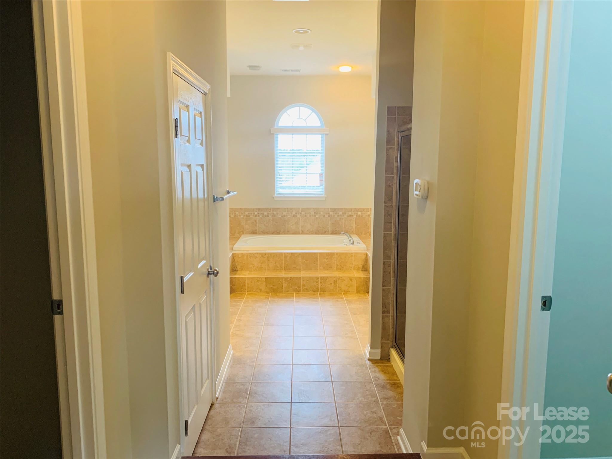 1472 Chandler Avenue Northwest Concord, NC 28027 - Photo 13 of 21 a view of a bathroom from a hallway
