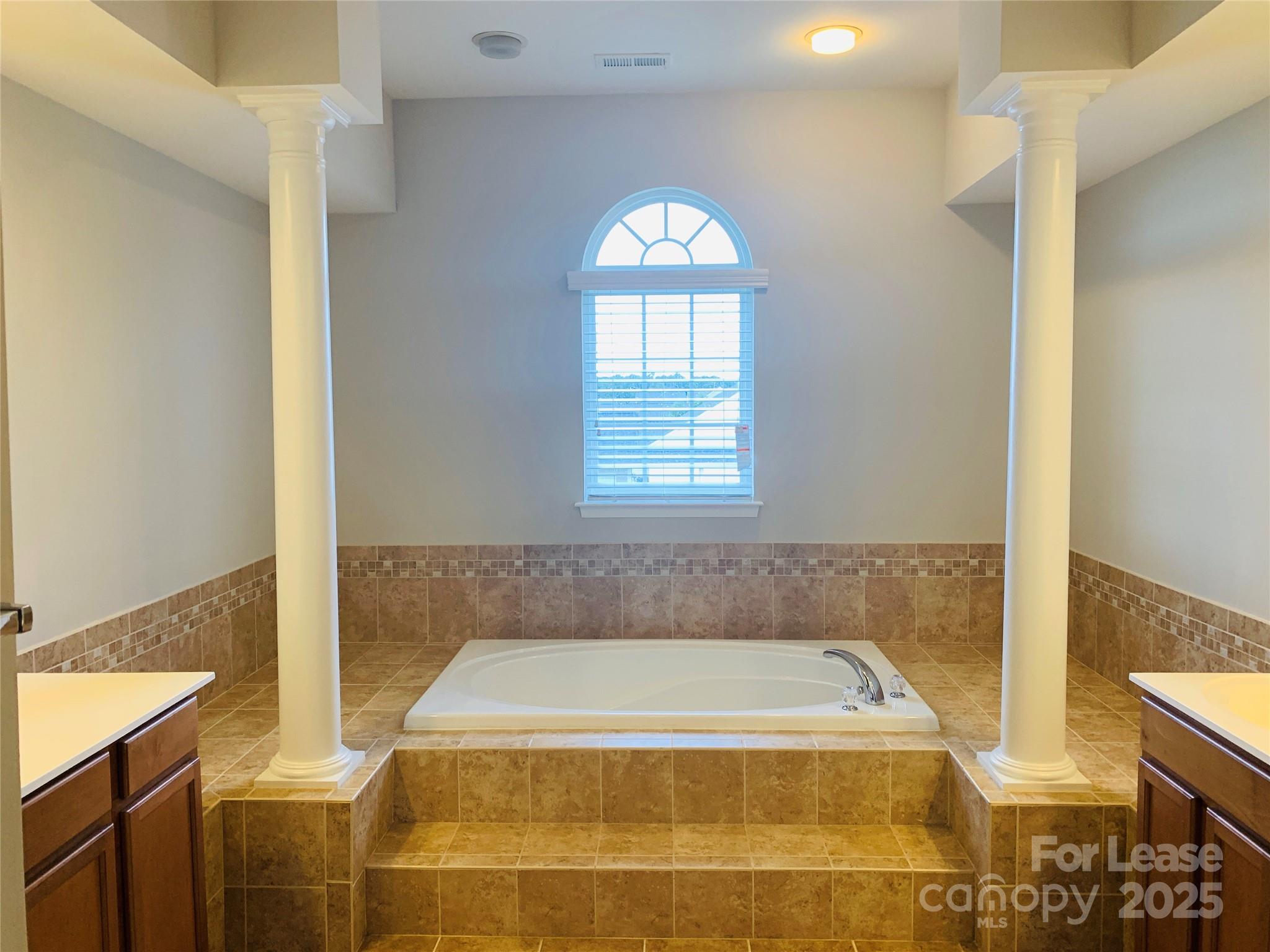 1472 Chandler Avenue Northwest Concord, NC 28027 - Photo 14 of 21 a bathroom with a tub and shower