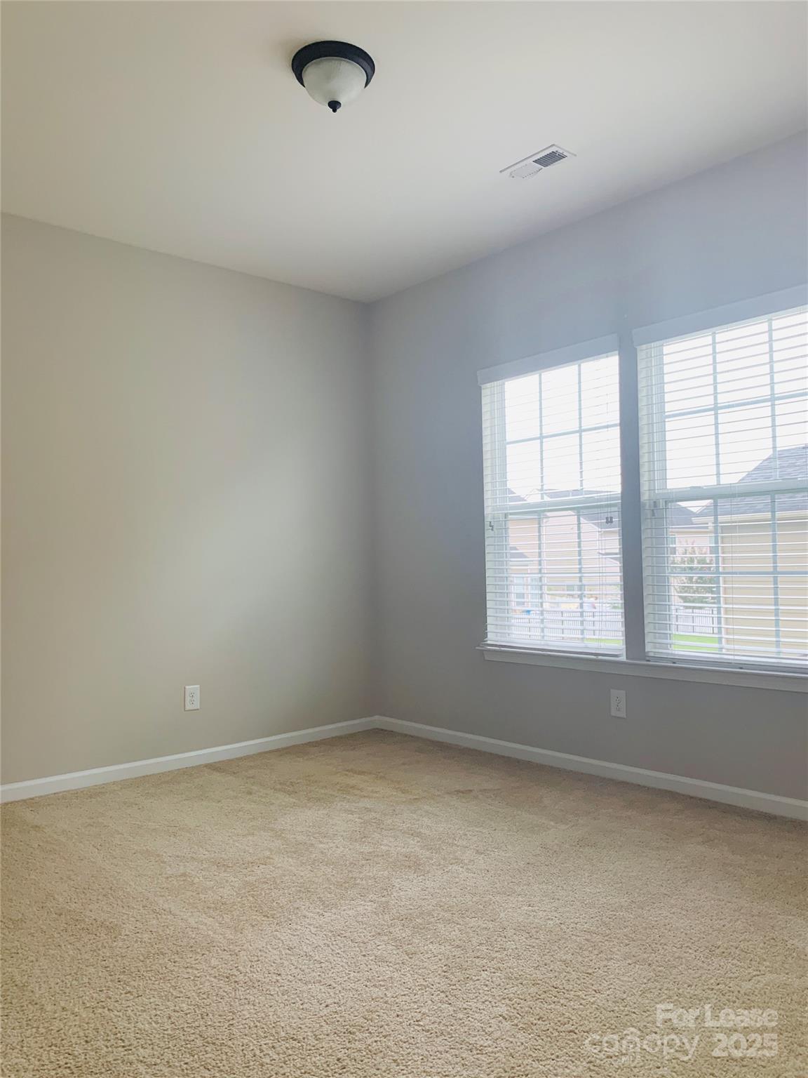 1472 Chandler Avenue Northwest Concord, NC 28027 - Photo 15 of 21 an empty room with a window