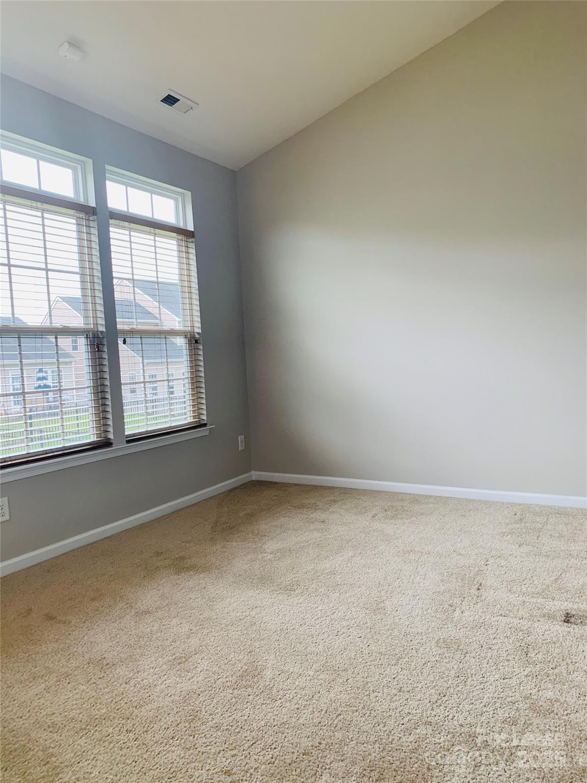 1472 Chandler Avenue Northwest Concord, NC 28027 - Photo 19 of 21 an empty room with a window