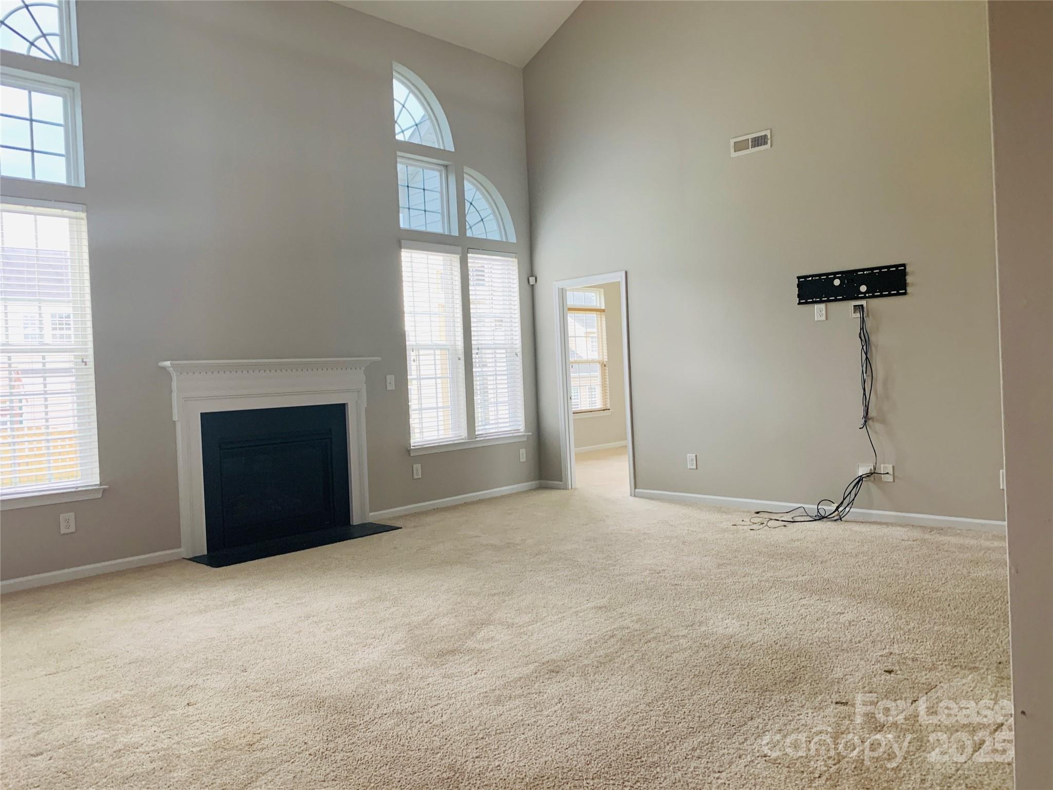 1472 Chandler Avenue Northwest Concord, NC 28027 - Photo 2 of 21 an empty room with windows
