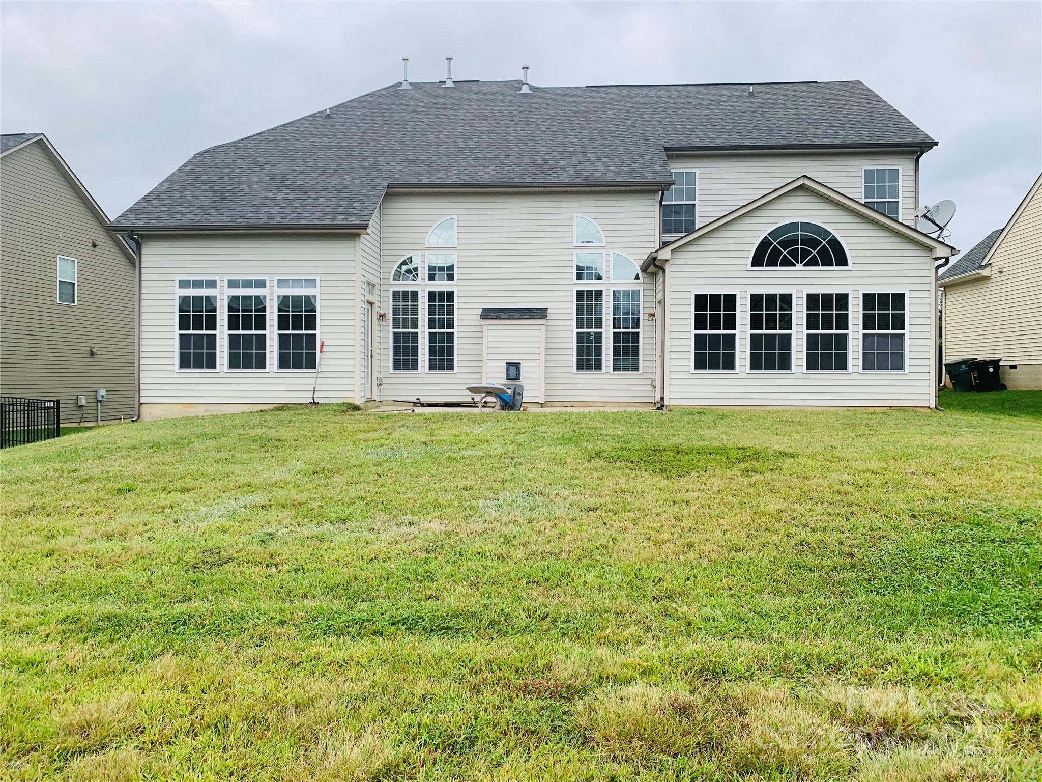 1472 Chandler Avenue Northwest Concord, NC 28027 - Photo 21 of 21 a front view of a house with a yard