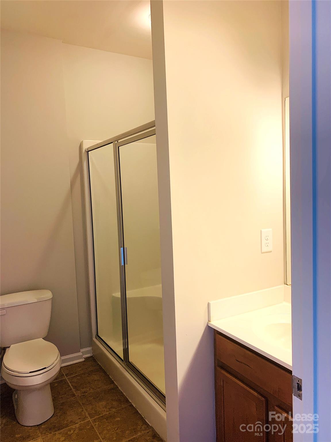 1472 Chandler Avenue Northwest Concord, NC 28027 - Photo 8 of 21 a bathroom with a toilet and a shower