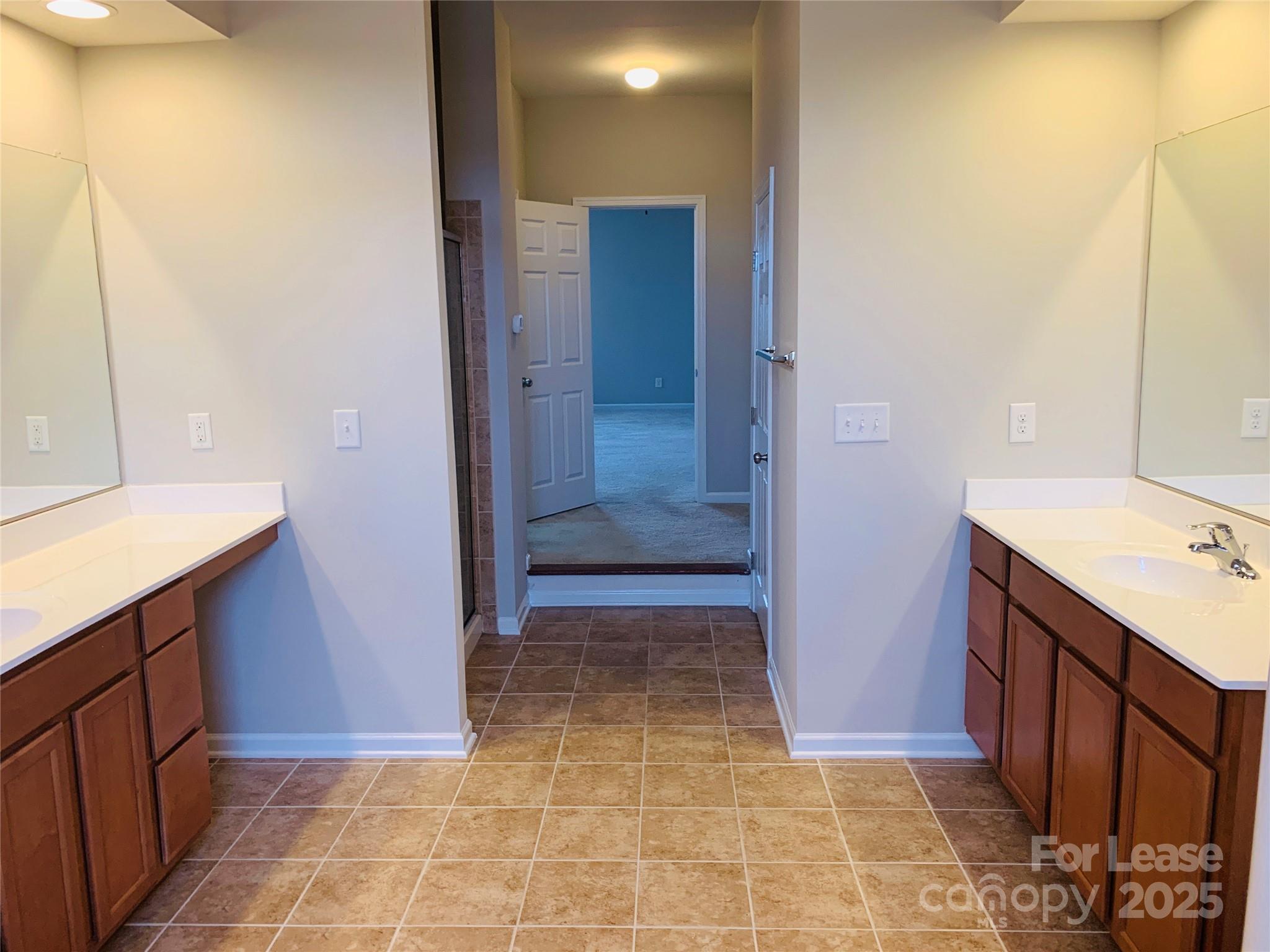 1472 Chandler Avenue Northwest Concord, NC 28027 - Photo 9 of 21 a bathroom with a sink and a mirror