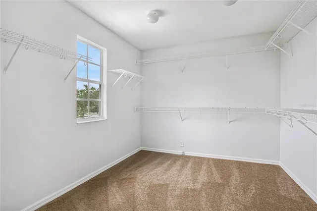 a view of a room that has a window in it