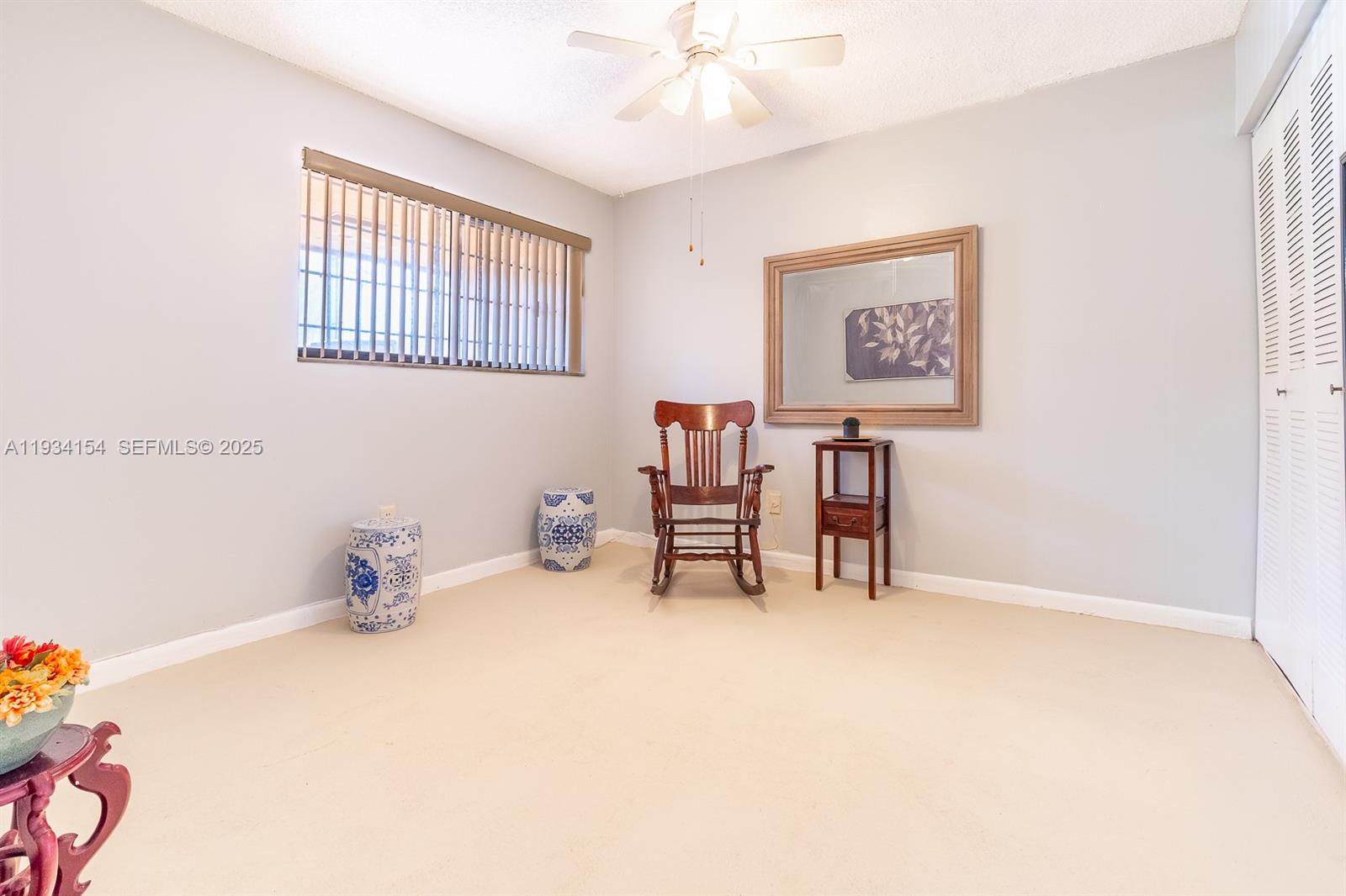 6491 Northwest 190th Terrace Hialeah, FL 33015 - Photo 23 of 28 a view of a livingroom with furniture and a window