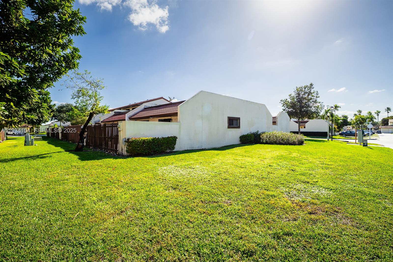 6491 Northwest 190th Terrace Hialeah, FL 33015 - Photo 3 of 28 a view of a house with backyard and garden