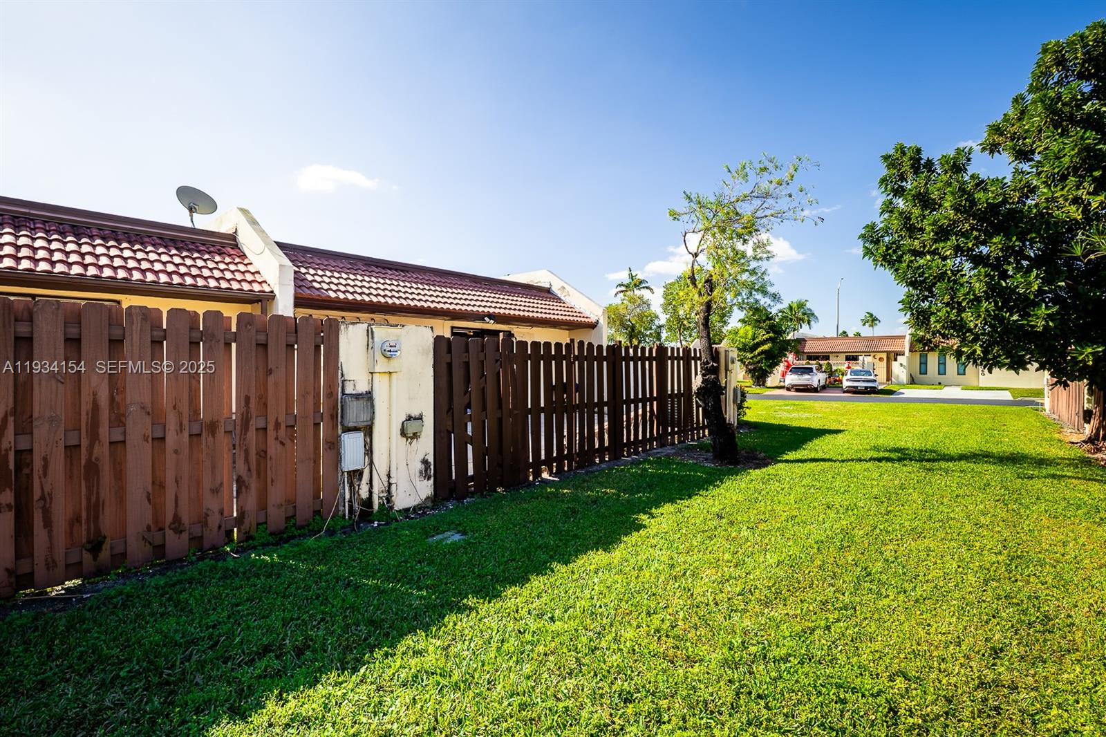 6491 Northwest 190th Terrace Hialeah, FL 33015 - Photo 4 of 28 a view of a porch with a yard