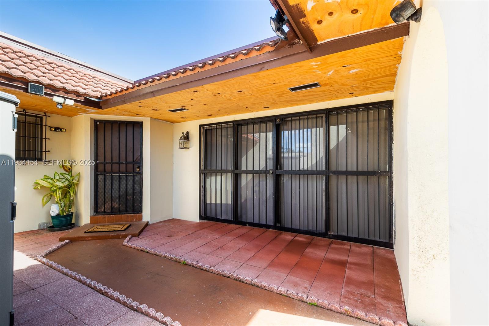 6491 Northwest 190th Terrace Hialeah, FL 33015 - Photo 5 of 28 a front view of a house