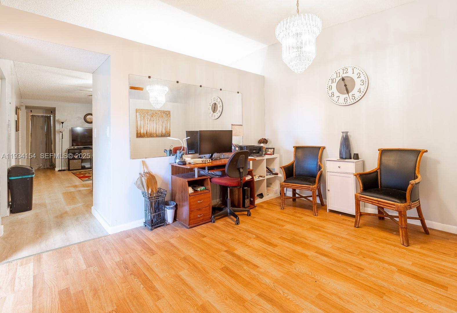 6491 Northwest 190th Terrace Hialeah, FL 33015 - Photo 8 of 28 a view of a workspace with furniture