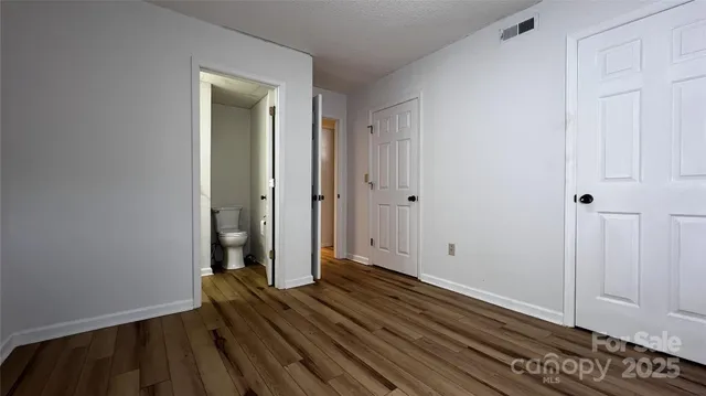 a bathroom with a toilet and a sink