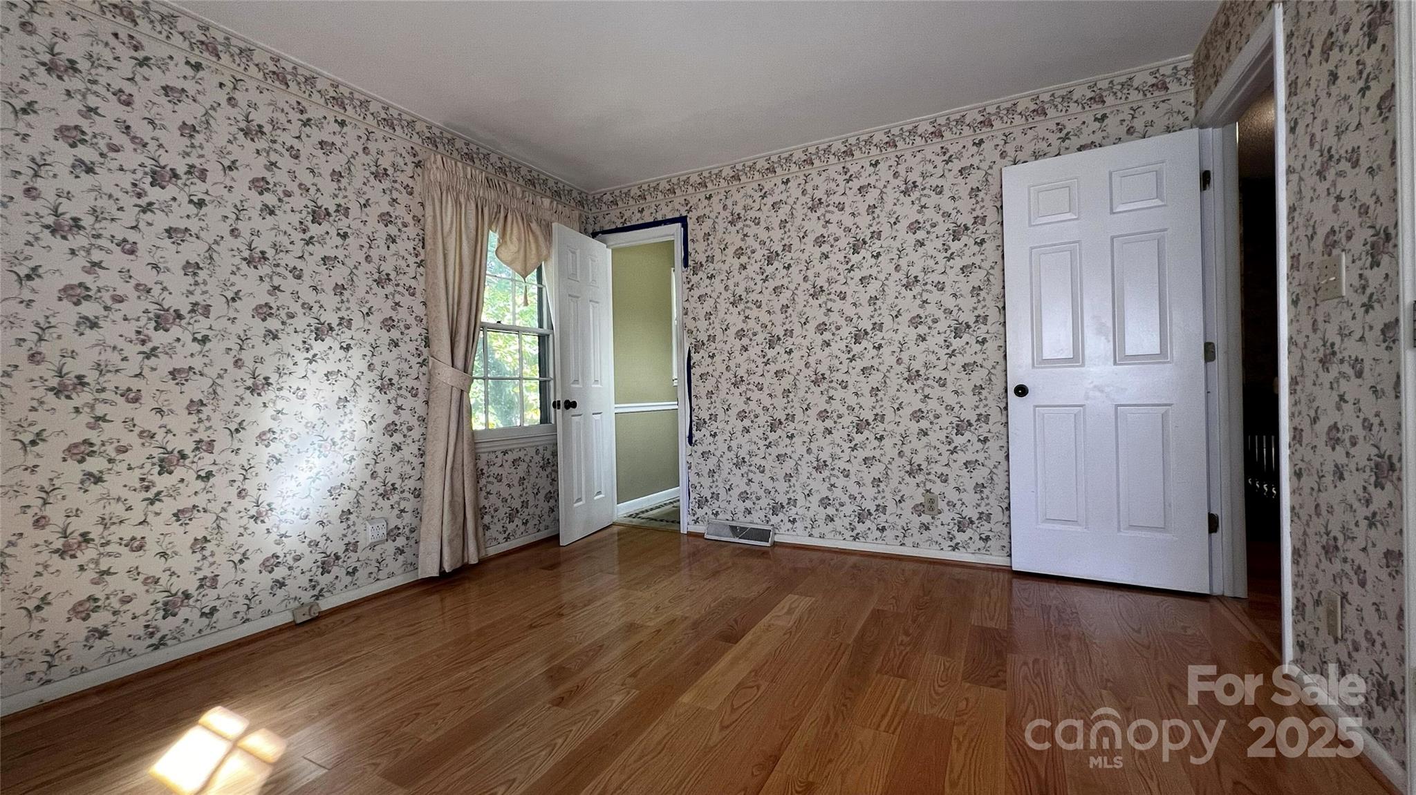 1325 Leolillie Lane Charlotte, NC 28216 - Photo 25 of 35 wooden floor in an empty room