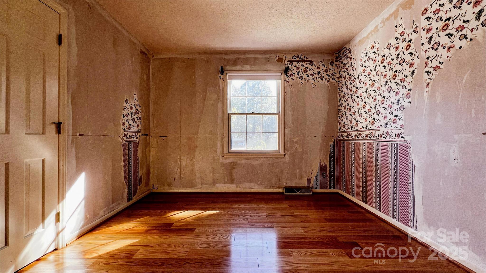 1325 Leolillie Lane Charlotte, NC 28216 - Photo 30 of 35 a view of entryway with wooden floor