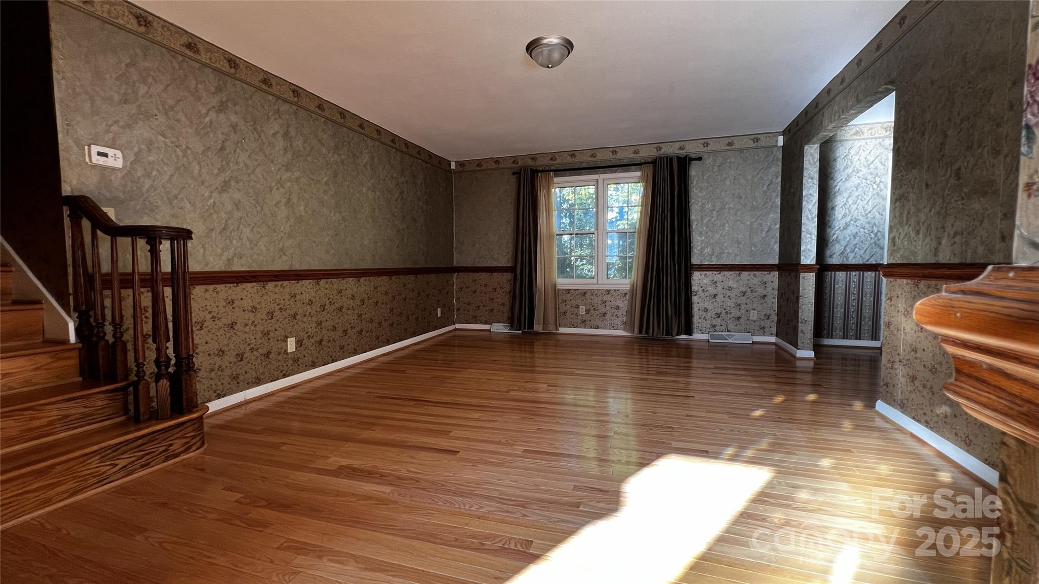 1325 Leolillie Lane Charlotte, NC 28216 - Photo 3 of 35 a view of empty room with wooden floor