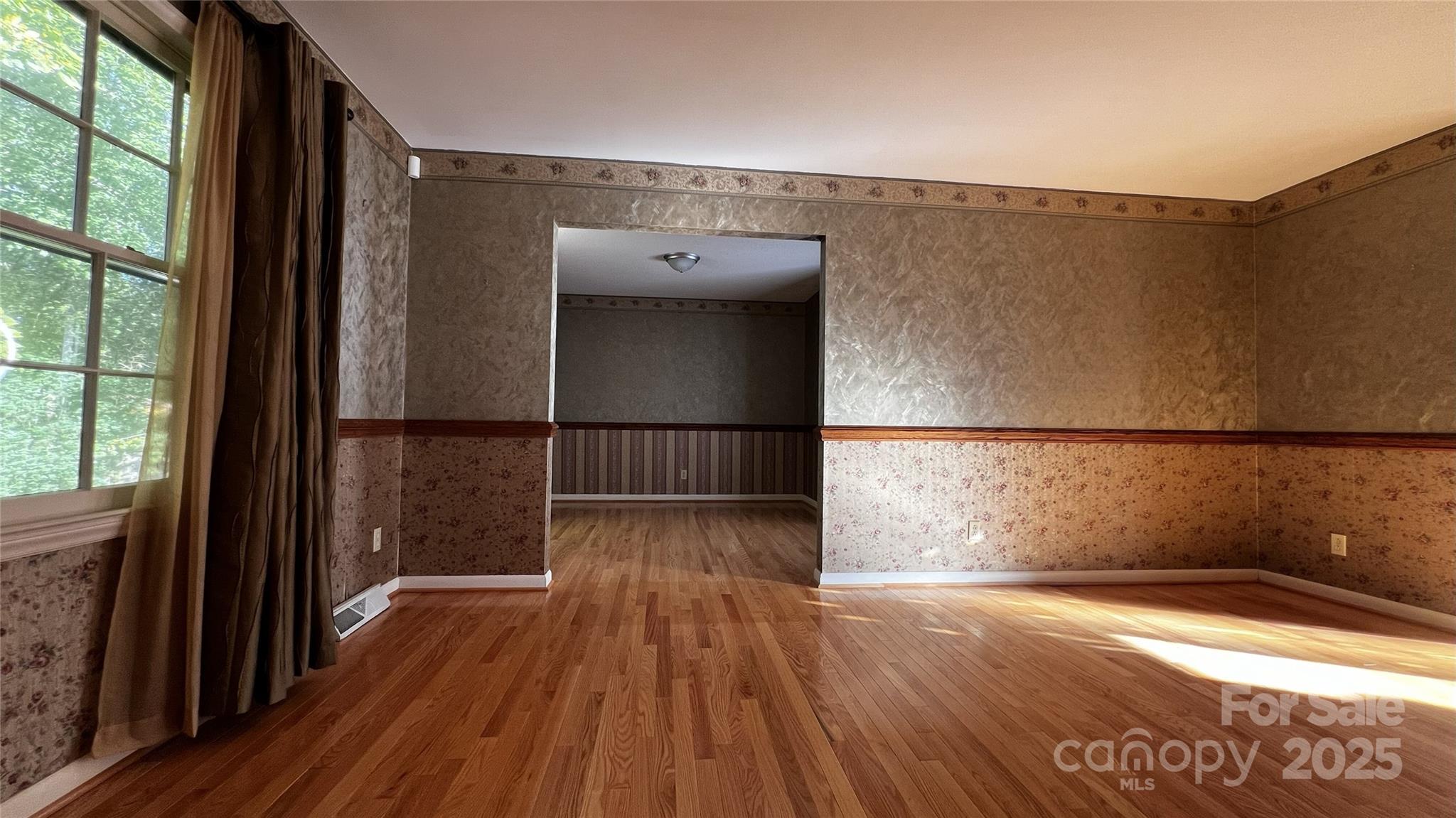 1325 Leolillie Lane Charlotte, NC 28216 - Photo 5 of 35 a view of a walk in closet