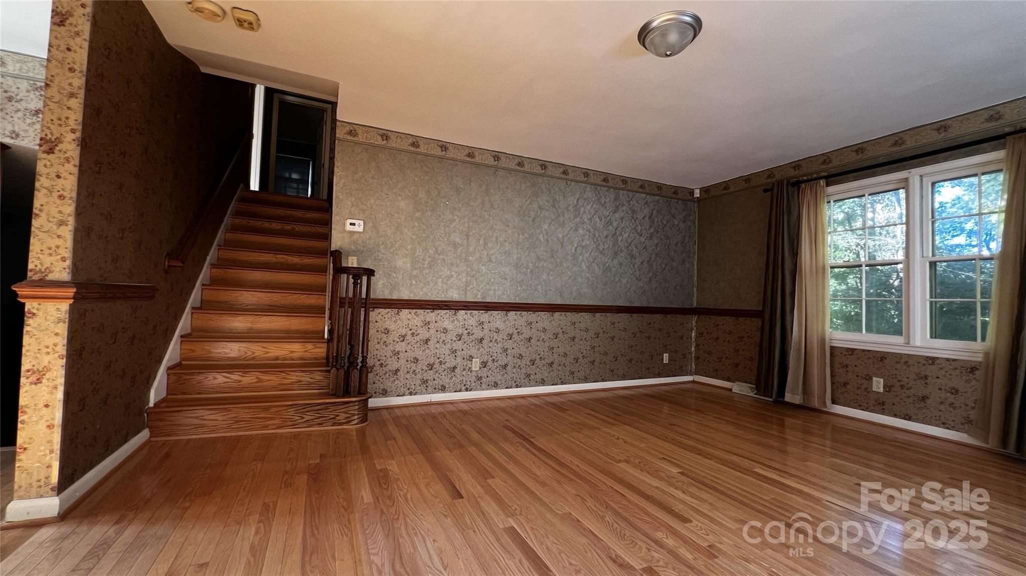 1325 Leolillie Lane Charlotte, NC 28216 - Photo 6 of 35 a view of entryway with wooden floor