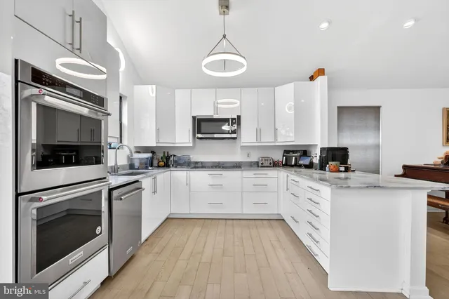 a view of a workspace with furniture