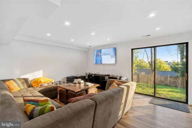 a view of a park with large trees