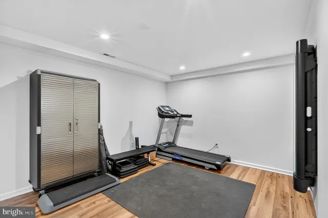 a front view of house with yard and trees