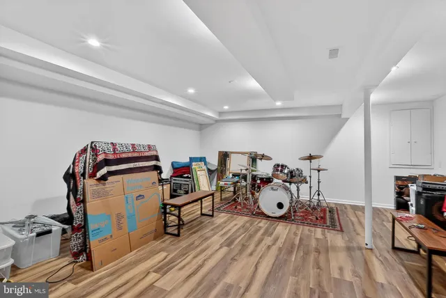 a view of a park with large trees