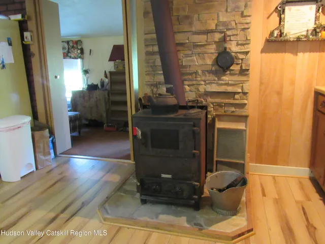a view of bathroom with a sink and a mirror