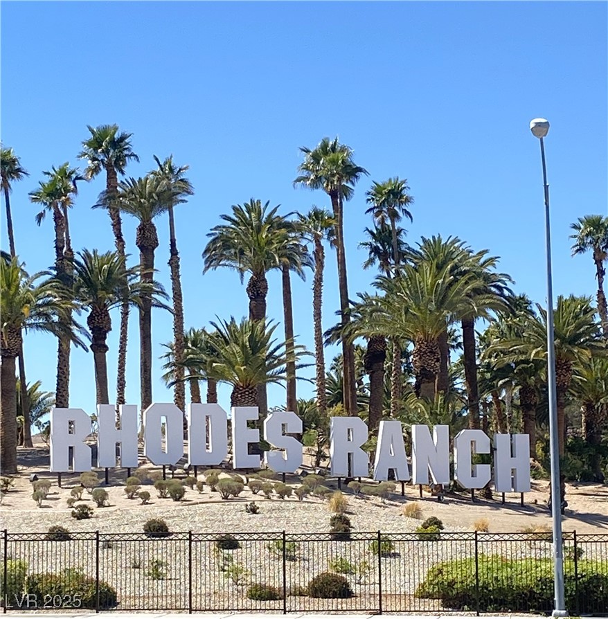 Community / neighborhood sign with fence